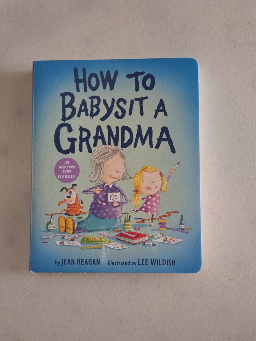 How to Babysit a Grandma - Children's Board Book (Blue Cover)